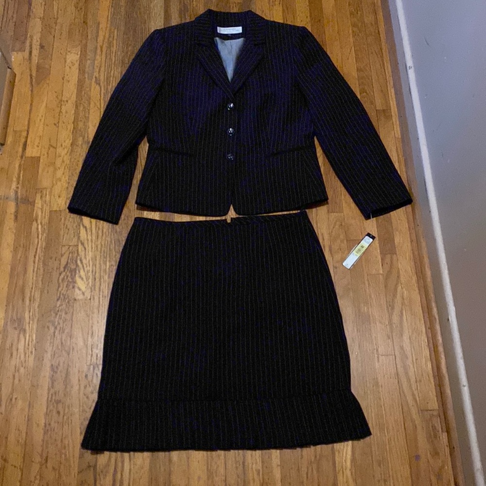 Black pinstripe suit. Jacket 12p skirt 14p
